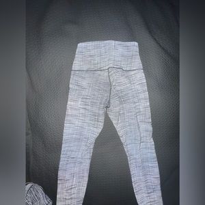 Lululemon lab reflective white leggings. Size 8. 69%Nylon/31%Lycra. Made in Indo
